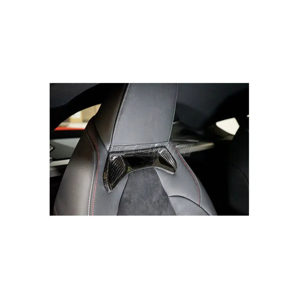 axis-parts-carbon-front-seat-headrest-trim-toyota-supra-mk5-a90-misc-and-798.jpg Axis Parts Carbon Front Seat Headrest Trim Toyota Supra MK5 A90 - Image 2