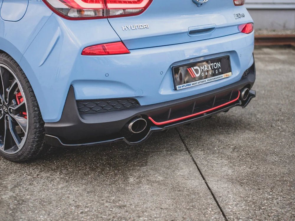 maxton-design-central-rear-splitter-with-vertical-bars-hyundai-i30-n-mk3-hatchback-17-20-gloss-black-splitters-skirts-diffusers-397.jpg Maxton Design Central Rear Splitter With Vertical Bars Hyundai I30 N MK3 Hatchback 17-20 - Image 3