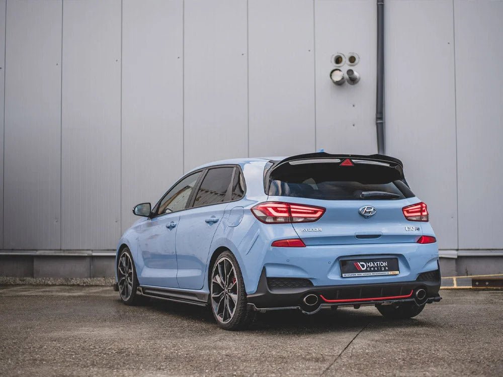 maxton-design-central-rear-splitter-with-vertical-bars-hyundai-i30-n-mk3-hatchback-17-20-gloss-black-splitters-skirts-diffusers-484.jpg Maxton Design Central Rear Splitter With Vertical Bars Hyundai I30 N MK3 Hatchback 17-20 - Image 2